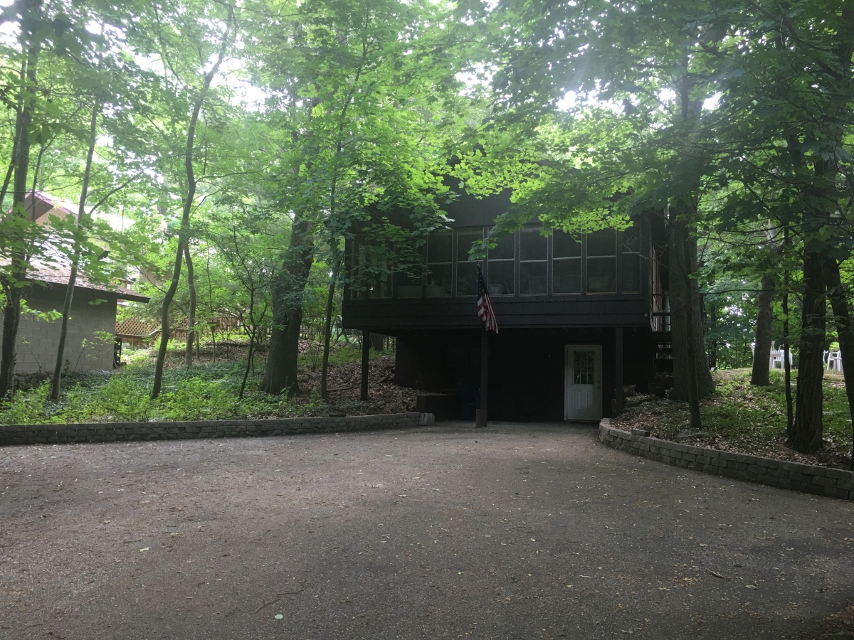 A building in the middle of some trees