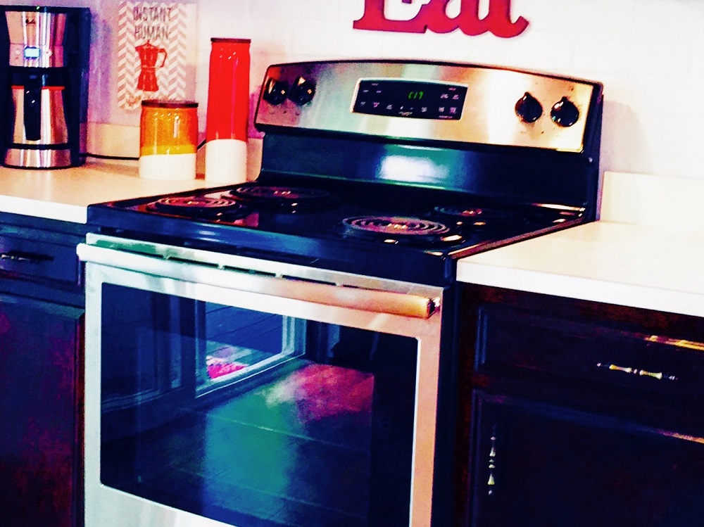 A stove with the word eat on it.