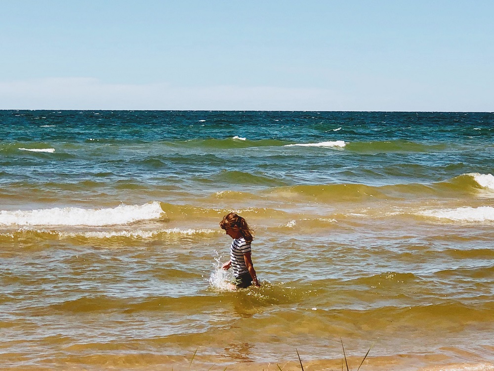 A person in the water at the beach