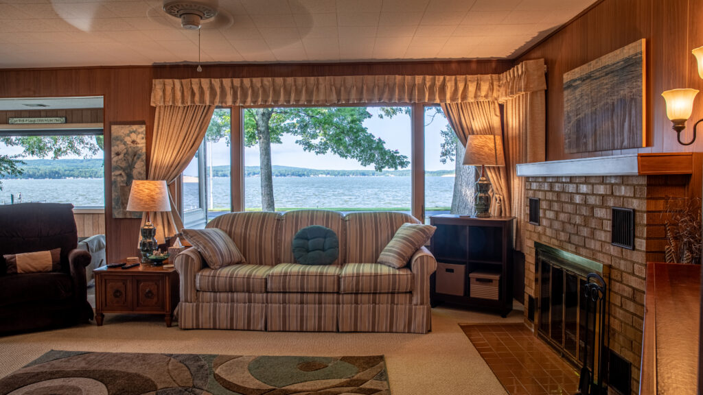 A living room with a couch and a table