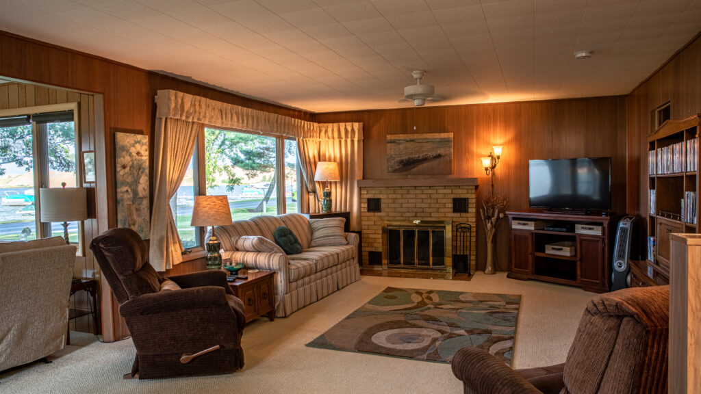 A living room with a couch and a table